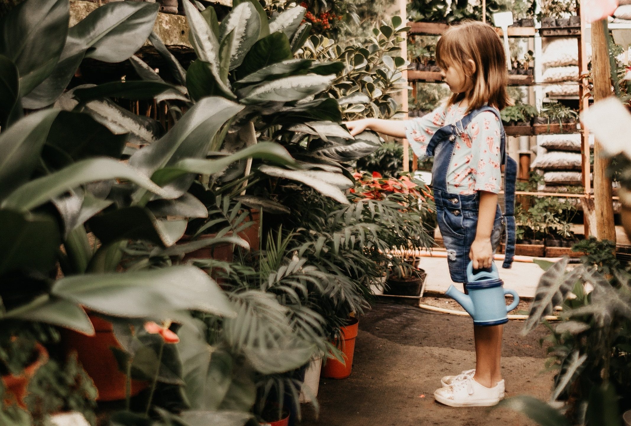 girl in greenhouse